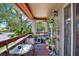 Relaxing balcony space with seating, plants, and a peaceful outdoor view at 10265 Gandy N Blvd # 906, St Petersburg, FL 33702