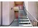 Exterior view showcasing unit access via outdoor stairs in a multi-unit building at 10265 Gandy N Blvd # 906, St Petersburg, FL 33702