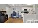 Open living area with a kitchen and an adjacent home office space at 10265 Gandy N Blvd # 906, St Petersburg, FL 33702