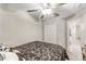 Bedroom featuring plush carpeting, ceiling fan, and closet at 10472 Shady Preserve Dr, Riverview, FL 33578