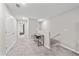 Hallway with a small desk area and view into a bedroom at 10472 Shady Preserve Dr, Riverview, FL 33578