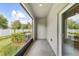 Enclosed lanai with outdoor views of the lawn, fence and bushes at 10472 Shady Preserve Dr, Riverview, FL 33578