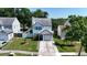 An elevated shot of a two-story home with a nice lawn, and a one-car garage at 10775 Glen Ellen Dr, Tampa, FL 33624