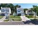 An elevated shot of a two-story home with a nice lawn, and a one-car garage at 10775 Glen Ellen Dr, Tampa, FL 33624