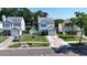 An elevated shot of a two-story home with a nice lawn, and a one-car garage at 10775 Glen Ellen Dr, Tampa, FL 33624
