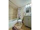 Clean bathroom featuring a bathtub with shower and a neutral vanity at 10800 Us Highway 19 N # 127, Pinellas Park, FL 33782