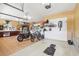 Well-organized garage features tiled floors, storage solutions, and room for hobbies at 11029 Lynn Lake Cir, Tampa, FL 33625