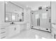Modern bathroom featuring a glass enclosed shower with black accents, a marble countertop vanity, and marble floors at 11921 Fort King Hwy, Thonotosassa, FL 33592