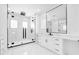 Modern bathroom featuring a glass enclosed shower with black accents, a marble countertop vanity, and marble floors at 11921 Fort King Hwy, Thonotosassa, FL 33592