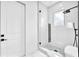 Modern bathroom features glass shower, rainfall shower head, and elegant fixtures at 11921 Fort King Hwy, Thonotosassa, FL 33592
