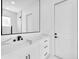 Modern bathroom featuring black fixtures and sleek rectangular mirror at 11921 Fort King Hwy, Thonotosassa, FL 33592