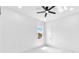 Minimalist bedroom with a window view of the outside and marble floors at 11921 Fort King Hwy, Thonotosassa, FL 33592