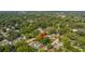 Aerial view of a home and neighborhood from above showcasing the community at 1216 E Lambright St, Tampa, FL 33604