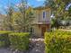Charming home with a well-maintained front yard and lush green hedges for added privacy at 1271 Drew St, Clearwater, FL 33755