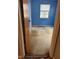 Bedroom with blue walls, stained carpet and a window at 12720 Jan St, San Antonio, FL 33576