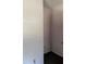 A bedroom with neutral walls and carpeted floors provides a blank canvas for personalization at 12720 Jan St, San Antonio, FL 33576