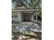 A covered carport featuring a concrete driveway at 12720 Jan St, San Antonio, FL 33576