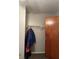 Small walk-in closet with a shelf and hanging rod at 12720 Jan St, San Antonio, FL 33576
