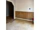 Charming dining area with wainscoting details and ample natural light, perfect for gatherings at 12720 Jan St, San Antonio, FL 33576