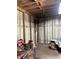 Shed interior featuring a workbench with tools at 12720 Jan St, San Antonio, FL 33576