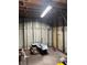 Shed interior featuring a workbench and tools at 12720 Jan St, San Antonio, FL 33576