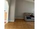 Cozy living area with neutral walls and tiled flooring, ready for personalization at 12720 Jan St, San Antonio, FL 33576