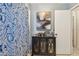 Bathroom featuring a blue paisley shower curtain and a dark wood cabinet at 1304 Cedar Ct, Tarpon Springs, FL 34689