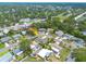 An eye catching aerial view highlighting neighborhood with tree lined streets and beautiful homes at 1322 Byron Dr, Clearwater, FL 33756