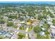A beautiful aerial view shows this homes perfect placement on a tree lined street at 1322 Byron Dr, Clearwater, FL 33756