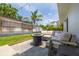 Relaxing outdoor patio area with comfortable seating and a cozy fire pit at 1322 Byron Dr, Clearwater, FL 33756