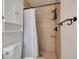 Updated bathroom with tiled shower and modern fixtures at 1322 Byron Dr, Clearwater, FL 33756