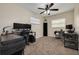 Bedroom has multiple computer work stations and a ceiling fan at 1322 Byron Dr, Clearwater, FL 33756