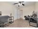 Bedroom has multiple computer work stations and a ceiling fan at 1322 Byron Dr, Clearwater, FL 33756