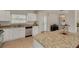Updated kitchen features granite countertops and stainless steel appliances at 1322 Byron Dr, Clearwater, FL 33756