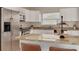 The kitchen boasts stainless steel appliances and granite countertops at 1322 Byron Dr, Clearwater, FL 33756