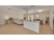 Open concept living room shows living, dining, and kitchen areas at 1322 Byron Dr, Clearwater, FL 33756