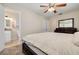Comfortable main bedroom features ceiling fan and ensuite bathroom at 1322 Byron Dr, Clearwater, FL 33756