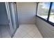 Balcony with tile flooring and sliding glass doors at 1400 Gandy N Blvd # 1705, St Petersburg, FL 33702