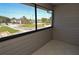 Balcony with a view of grass and trees at 1400 Gandy N Blvd # 1705, St Petersburg, FL 33702
