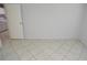 This bedroom features neutral paint and tiled floors at 1400 Gandy N Blvd # 1705, St Petersburg, FL 33702