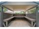 Wooden gazebo featuring bench seating around the perimeter at 1400 Gandy N Blvd # 1705, St Petersburg, FL 33702