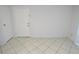 Entry way features a white door and neutral decor, leading into the home at 1400 Gandy N Blvd # 1705, St Petersburg, FL 33702