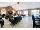 Open lounge area with a pool table, sofas, bar, and a fireplace, perfect for gatherings and relaxation at 1400 Gandy N Blvd # 1705, St Petersburg, FL 33702
