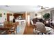 Open concept floor plan of kitchen, dining room and living room at 14409 Curley Rd, Dade City, FL 33525