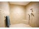 Modern tiled shower with seat and dual shower heads at 14409 Curley Rd, Dade City, FL 33525