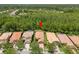 Aerial view of single Gathering home in a lush, gated community at 14634 Mirasol Manor Ct, Tampa, FL 33626