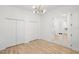 Bonus room featuring natural light, access to the kitchen, and two closets at 14634 Mirasol Manor Ct, Tampa, FL 33626