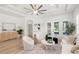 Bright living room boasts hardwood floors, lots of natural light, and neutral tones at 14634 Mirasol Manor Ct, Tampa, FL 33626