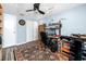 Home office with vinyl floors, a ceiling fan, and an oriental rug at 16011 Saddle Creek Dr, Tampa, FL 33618