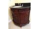 Bathroom with ornate vanity, a black granite countertop, and a decorative vessel sink at 17220 Estes Rd, Lutz, FL 33548